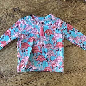 Ruffle butts flamingo zip rash guard top